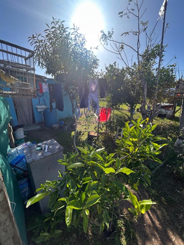 Casa sola en lote con quincho