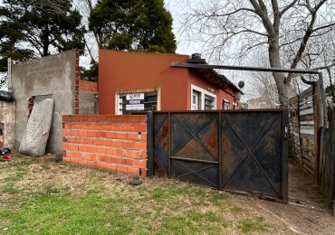 Venta de lote con construccion